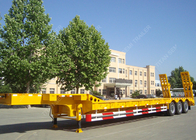 Customized tri axle 80 ton heavy low bed semi trailer for Algeria supplier